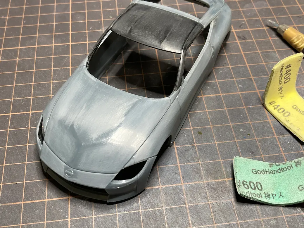 アオシマ THE SNAPKIT NISSAN RZ34 フェアレディZ 表面をやすりがけしたボディペーつの画像